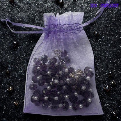 Purple crystal and pearl necklace and bracelet set in a gift bag