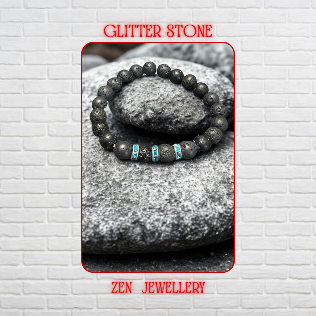 Close-up view of natural volcanic lava beads showing porous texture and organic matte black finish beside sparkling turquoise rhinestone spacer details. The bracelet creates a minimalist bohemian style inspired by grounding volcanic energy and modern handmade jewellery design. Different bead sizes create balance and visual interest across the bracelet.