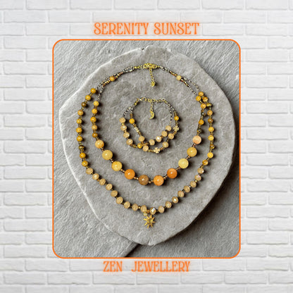 Close-up view of the gemstone beads showing polished yellow jade stones, faceted champagne crystal beads, and warm amber accents. The gold spacer beads add shine and contrast, while the handcrafted arrangement creates a soft bohemian feel.