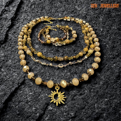 Faceted champagne and brown beads reflecting light on a handmade beaded jewellery set.