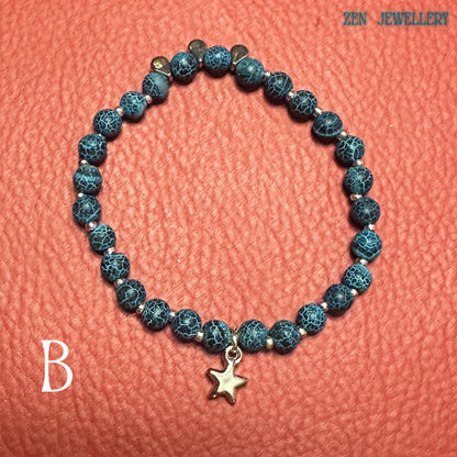 Handmade Blue Crackle Agate bracelet displayed beside the matching necklace featuring coordinating turquoise crackled gemstone beads, silver spacer accents, and a small dangling silver star charm attached to the chain extension, creating a balanced layered jewellery set with celestial inspiration, feminine elegance, lightweight structure, and artistic handmade craftsmanship suitable for everyday wear or meaningful gifting.