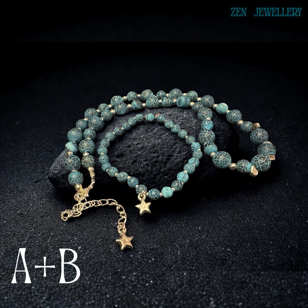 Close-up image highlighting the silver chain extension and dangling silver star charm attached to the Blue Crackle Agate necklace clasp showing delicate handcrafted metalwork, polished silver closure details, and celestial decorative elements that add mystical elegance and movement to the gemstone jewellery design while complementing the rich turquoise and black crackled bead colours beautifully.