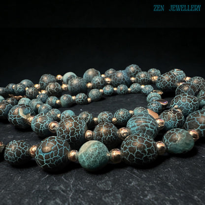 Blue Crackle Agate bracelet photographed individually showing smaller coordinating crackled gemstone beads arranged with polished silver spacers and a delicate silver star charm that creates a lightweight celestial jewellery accessory perfect for layering with other bracelets or wearing alone as a minimalist boho gemstone statement piece with ocean-inspired colours.