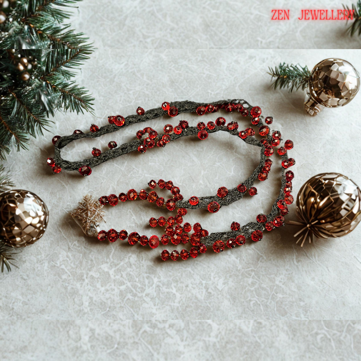 Statement RED CRYSTAL crochet necklace shown in close detail to reveal the luxurious texture of the faceted ruby beads and braided black strands. The handmade construction combines soft flexible crochet with bold shimmering crystals placed organically throughout the design. The asymmetrical shape creates graceful movement while maintaining balance and elegance. The rich scarlet tones against the dark base create a glamorous gothic boho style perf