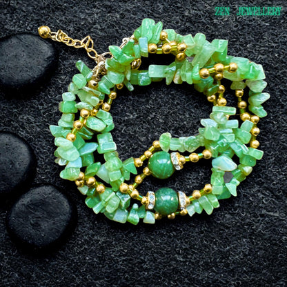 Close-up view of polished green jade chips mixed with shiny golden spacer beads, creating an elegant boho gemstone jewellery design with natural earthy texture and sparkle. Natural GREEN AVENTURINE jewellery set with a gold clasp and layered gemstone design styled beautifully for elegant bohemian fashion lovers.