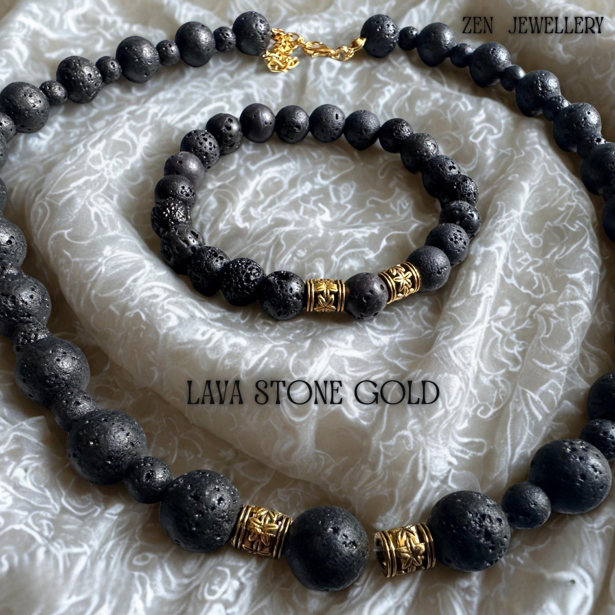 Elegant close-up of the necklace clasp and golden extension chain, highlighting the refined handmade details of the volcanic bead jewellery set. The natural lava stones feature a porous matte surface with organic texture variations that make each piece unique. The combination of black volcanic beads and warm gold accents creates a balanced, minimalist bohemian style.