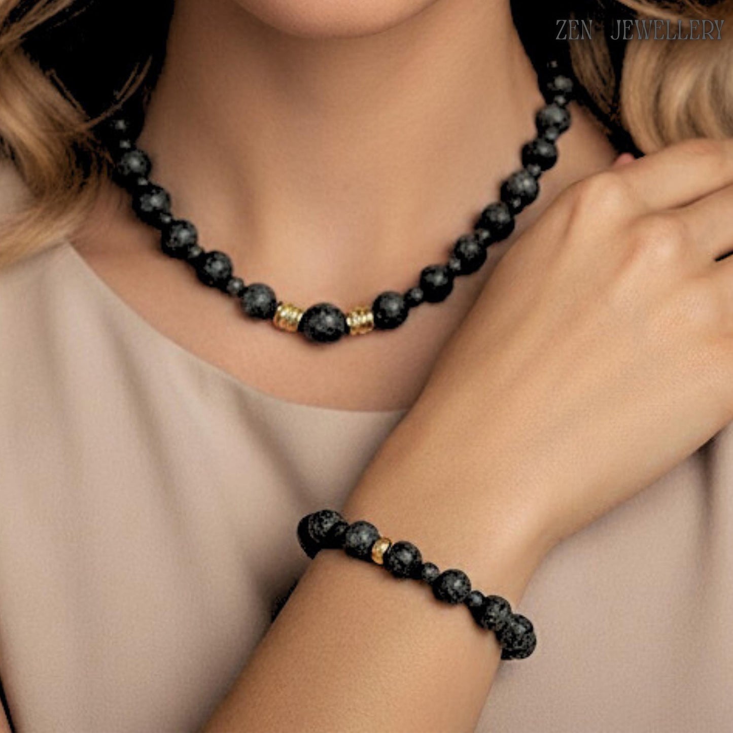 beautiful and elegant set of lava stone and golden spacers on model