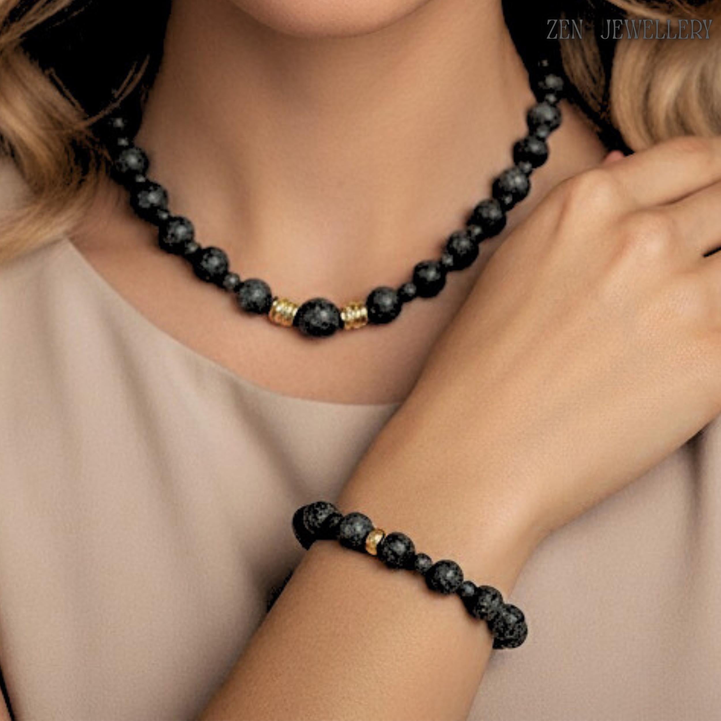 beautiful and elegant set of lava stone and golden spacers on model