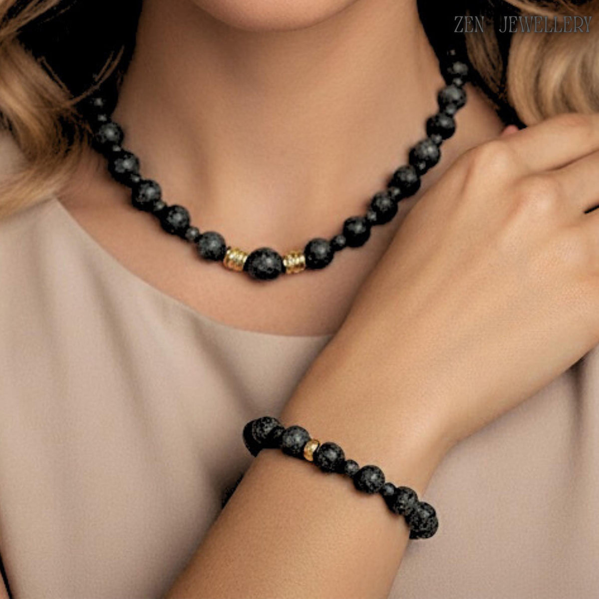 beautiful and elegant set of lava stone and golden spacers on model