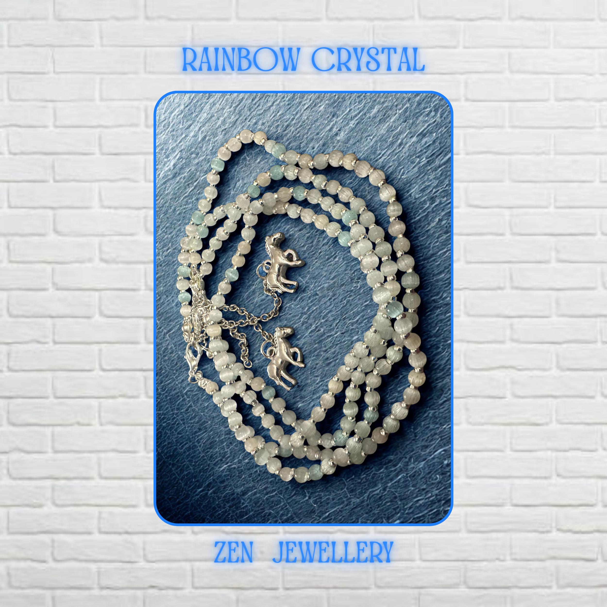Close-up view highlighting the faceted white crystal beads that reflect light with subtle sparkle and elegance. The sterling silver horse charm hangs delicately from the extension chain creating an equestrian-inspired focal point. Fine craftsmanship is visible throughout the necklace and bracelet set, showing uniform bead placement and a lightweight handmade design suitable for daily wear and special occasions.