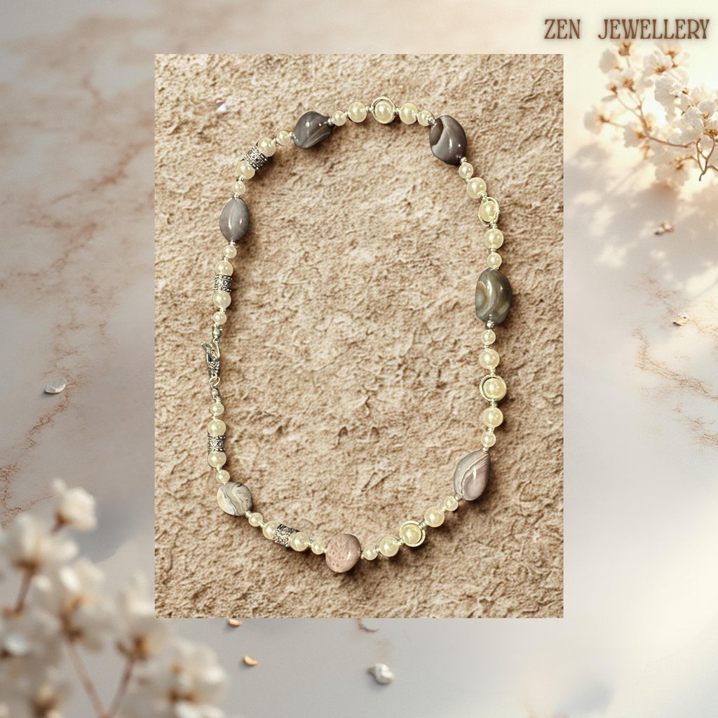 Handmade agate bead necklace in earthy grey and beige tones with vintage silver hardware.