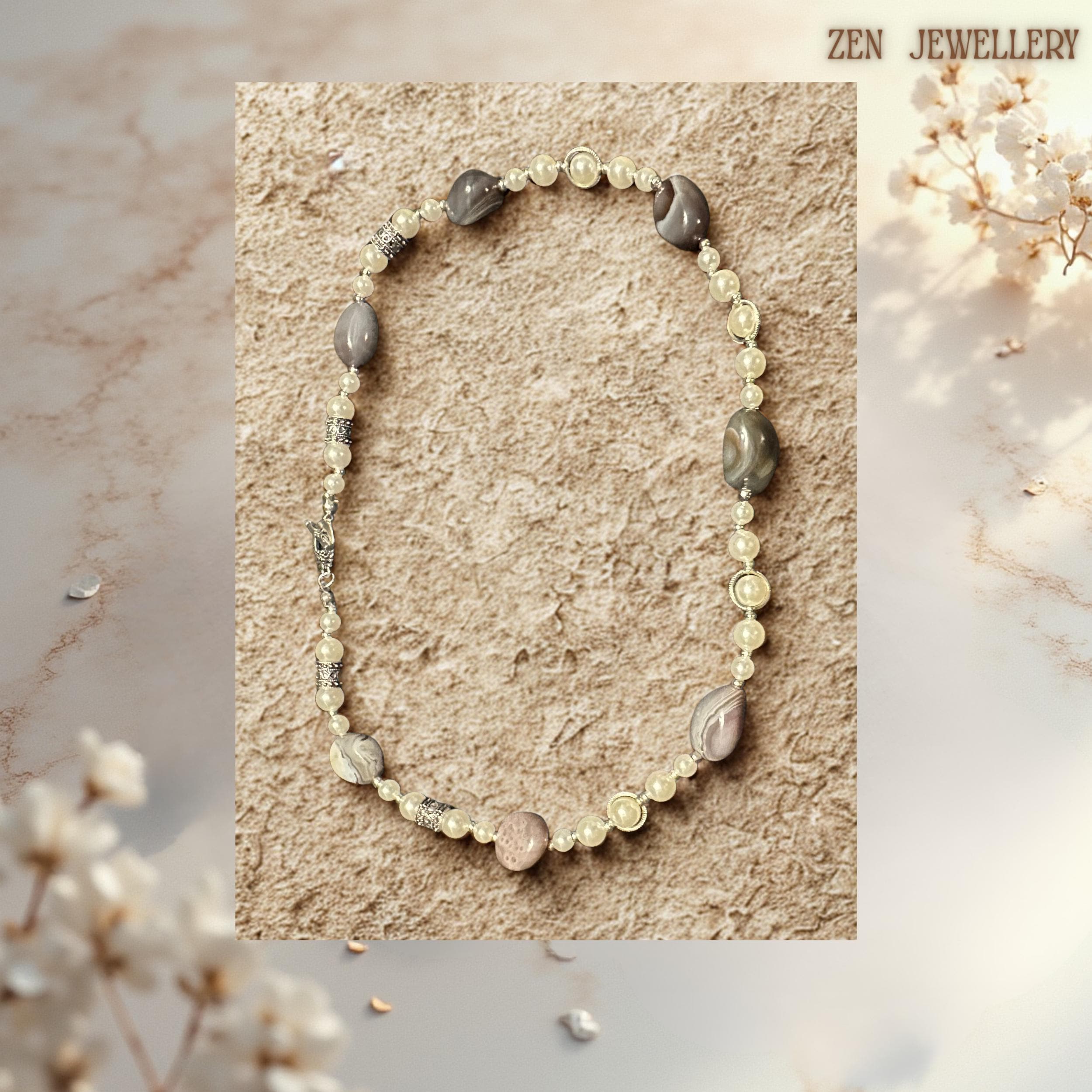Handmade agate bead necklace in earthy grey and beige tones with vintage silver hardware.