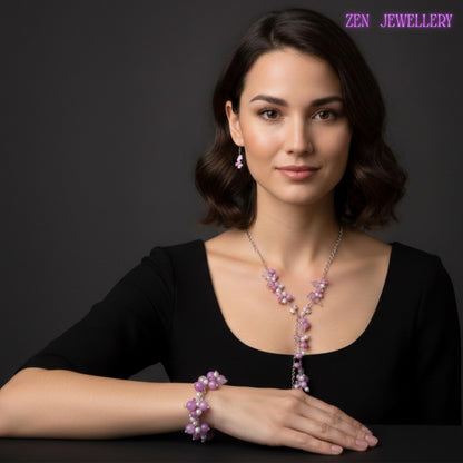 Model wearing an elegant fuchsia, white and pink gemstones necklace, bracelet and earrings