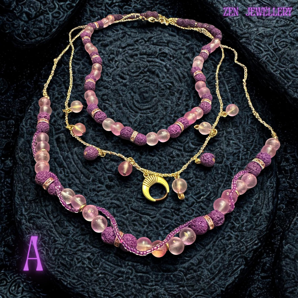 Gold chain necklace with dangling moon charm and bead accents.
Statement necklace design showing layered bead arrangement.
Necklace A length shown approximately 50 to 56cm adjustable.