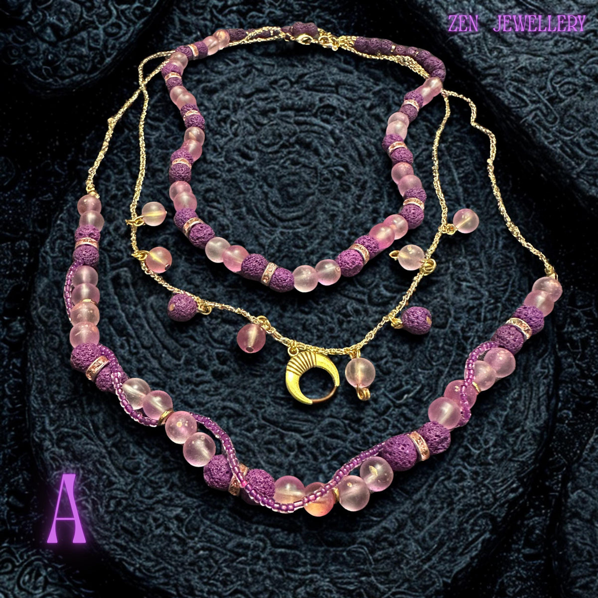 Gold chain necklace with dangling moon charm and bead accents.
Statement necklace design showing layered bead arrangement.
Necklace A length shown approximately 50 to 56cm adjustable.
