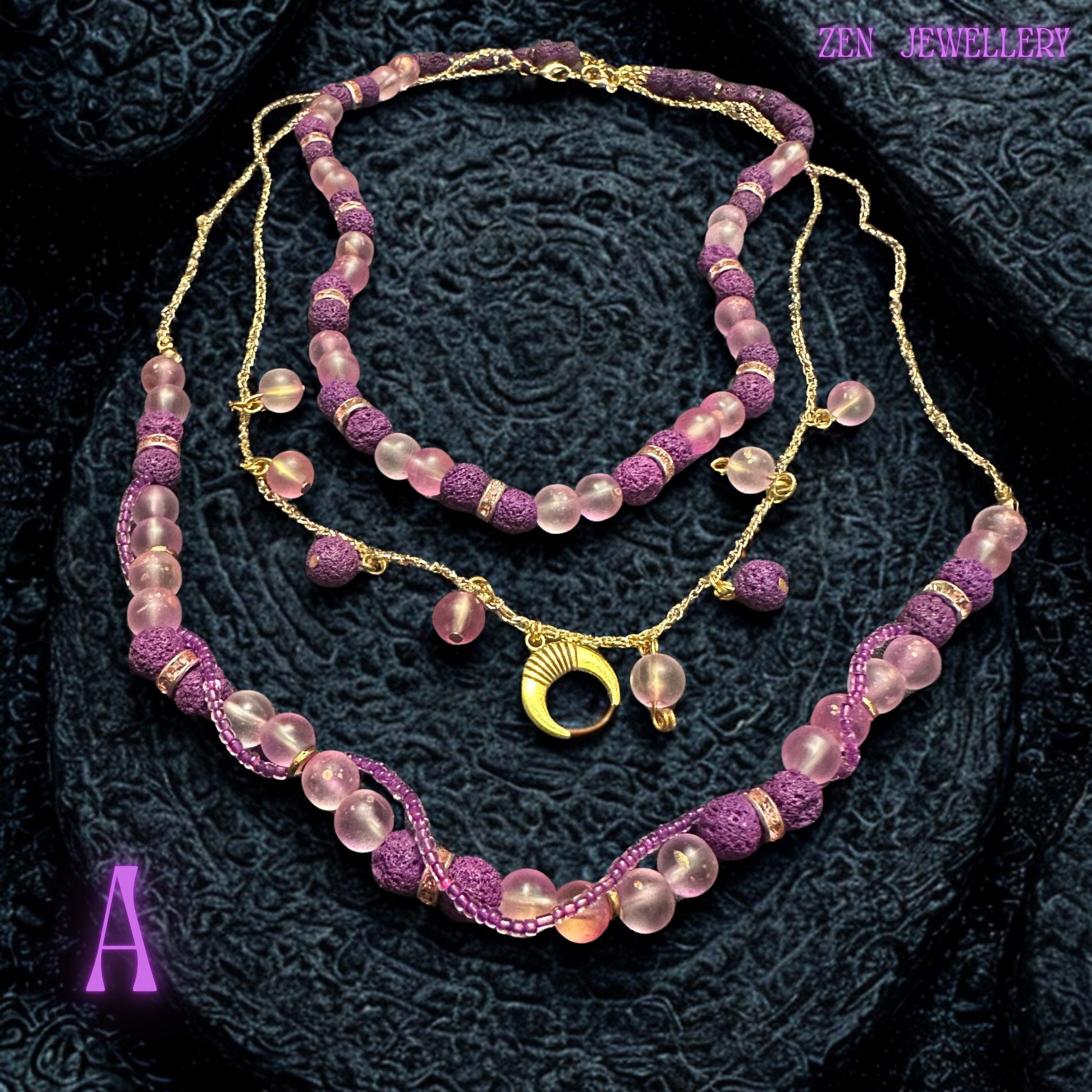 Gold chain necklace with dangling moon charm and bead accents.
Statement necklace design showing layered bead arrangement.
Necklace A length shown approximately 50 to 56cm adjustable.