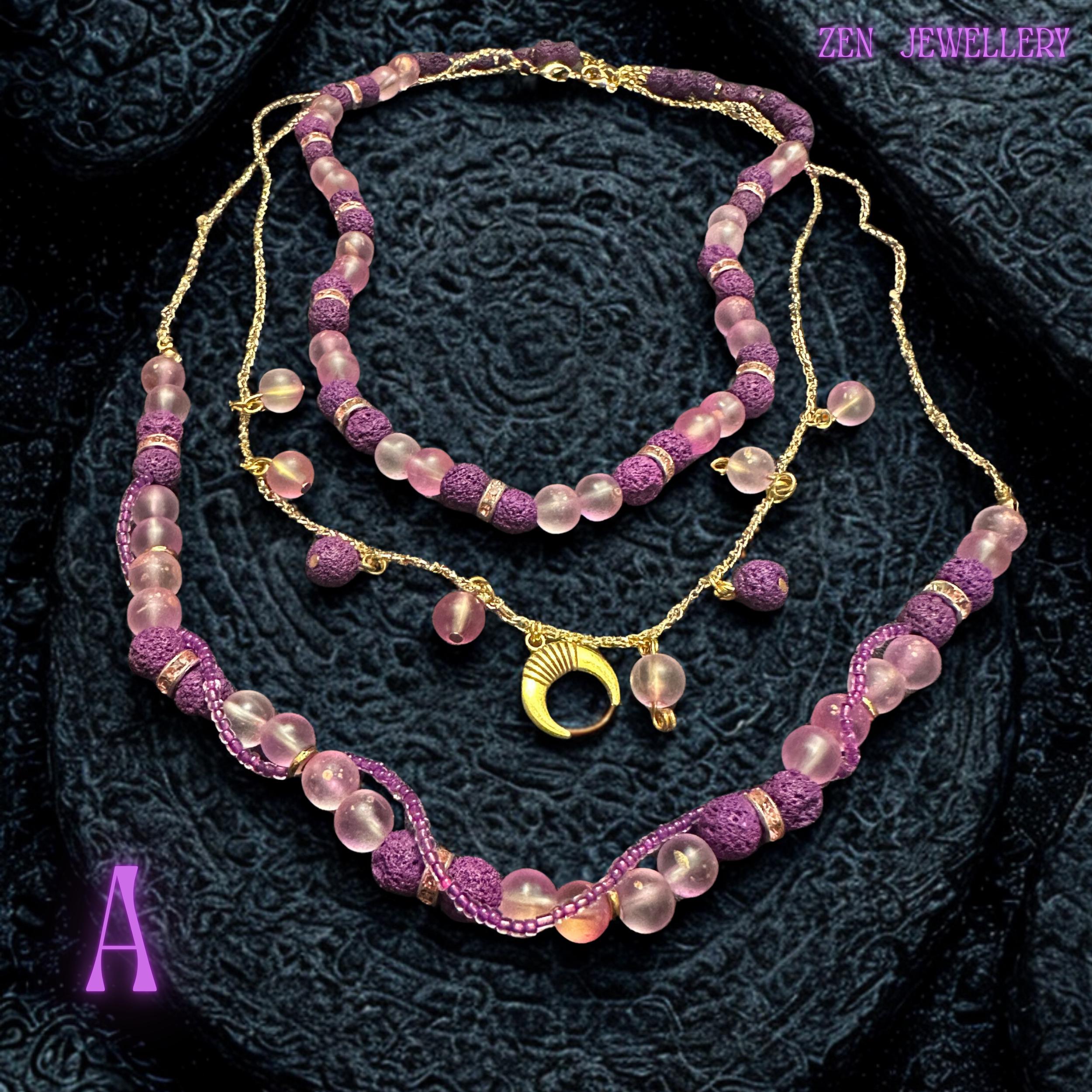 Gold chain necklace with dangling moon charm and bead accents.
Statement necklace design showing layered bead arrangement.
Necklace A length shown approximately 50 to 56cm adjustable.