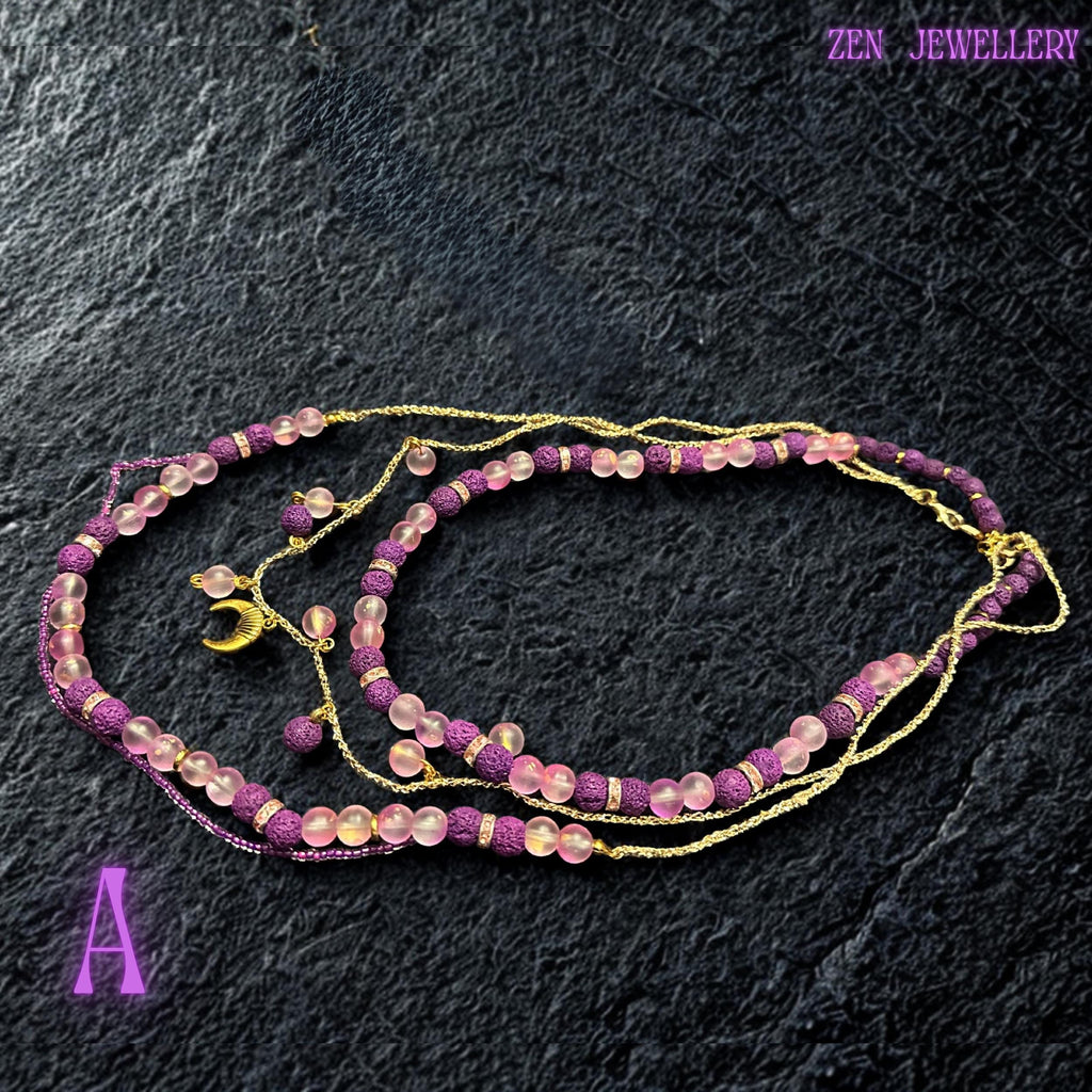 • Close-up photograph of the lower statement strand displaying handwoven pink seed bead details flowing between large translucent blush pink gemstone beads and matte purple lava stones. Small crystal spacer rings add subtle sparkle while the curved arrangement demonstrates the necklace flexibility and layered artistic design. The craftsmanship gives the jewellery set an elegant bohemian appearance suitable for festivals or evening styling.