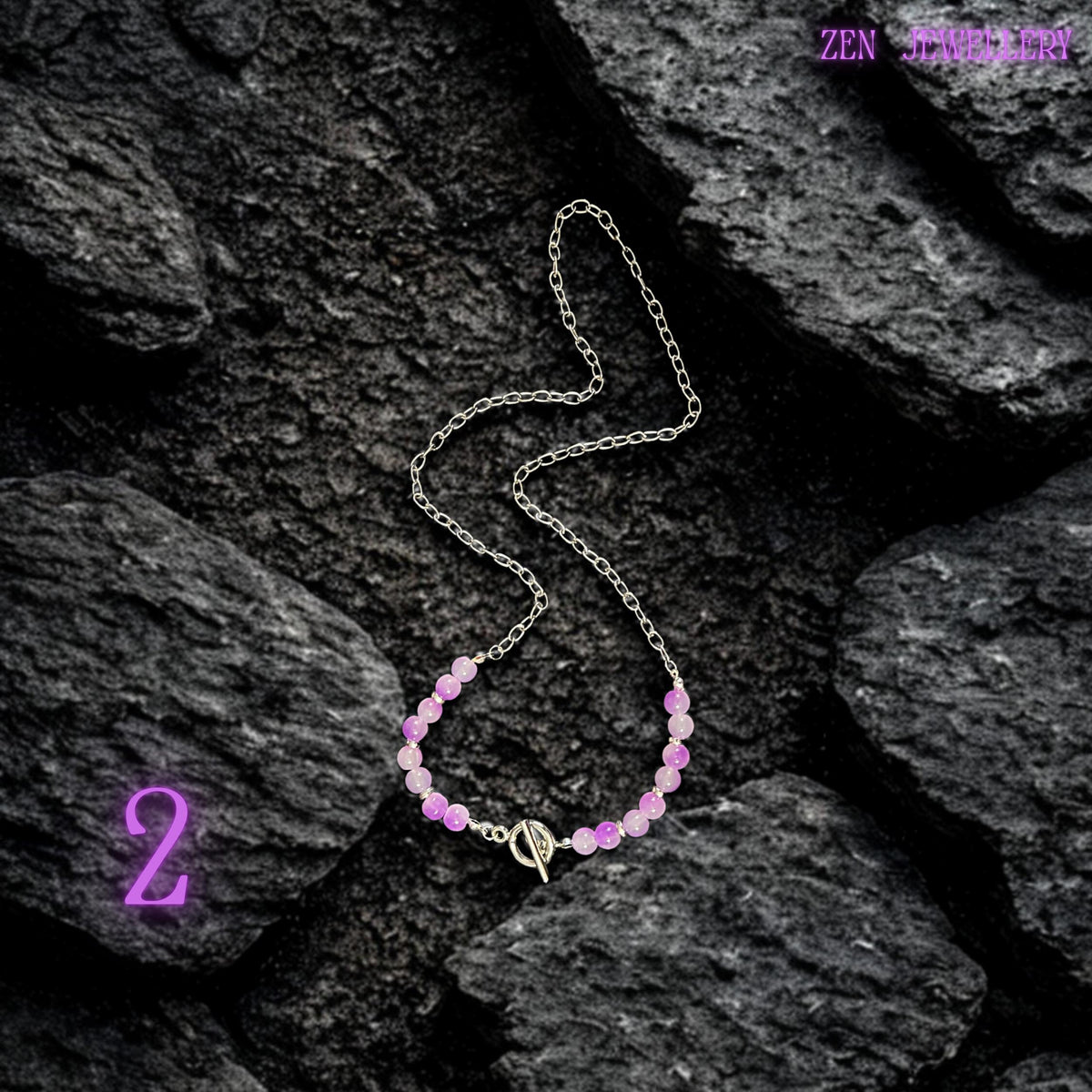 Feminine statement necklace featuring layered silver chain strands decorated with pastel pink, lavender, lilac, and purple gemstone beads attached to dangling chain details. The handcrafted arrangement creates soft movement and artistic texture while polished gemstone surfaces provide glossy shine. Chunky silver chain links contrast beautifully with the delicate pastel bead colours for a modern romantic look. The necklace is worn with a pale pink