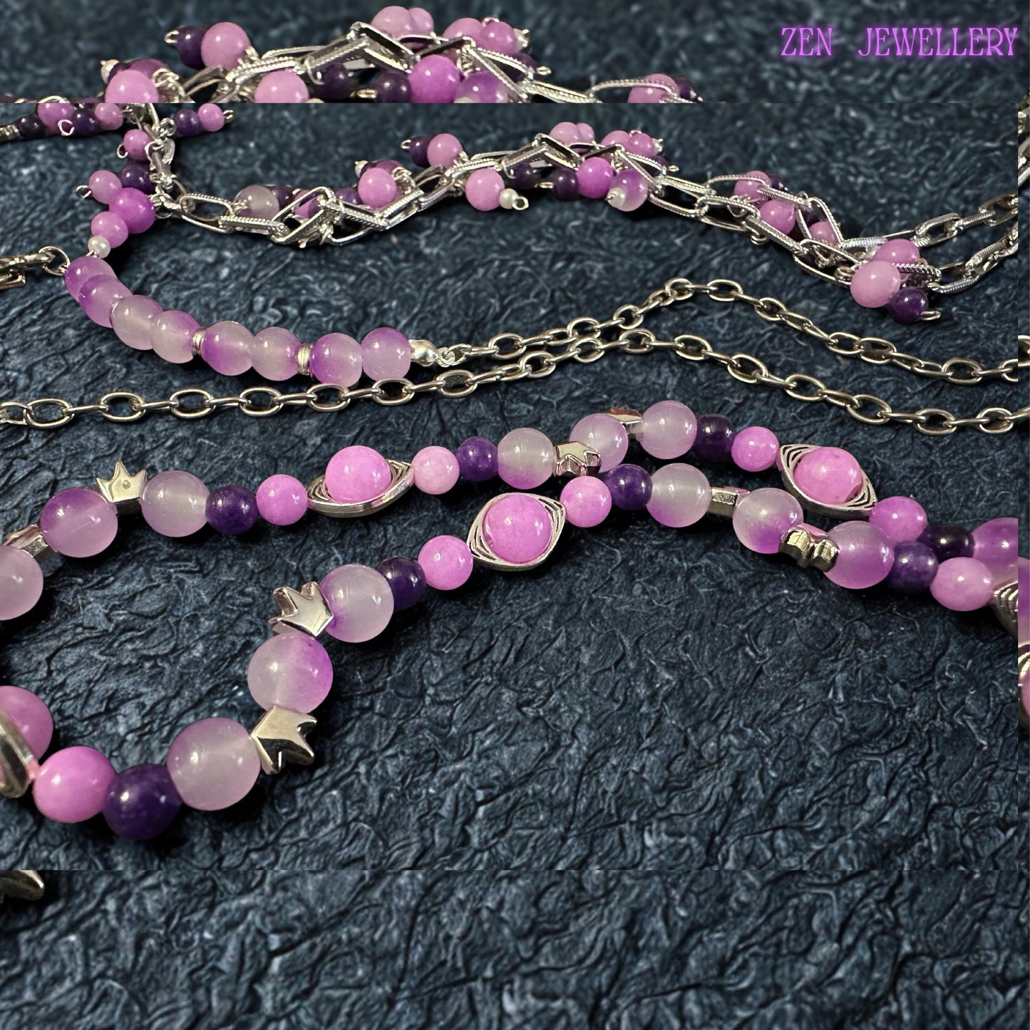• Feminine layered silver necklace featuring soft pink, lavender, lilac, and purple gemstone beads attached along chunky silver chain links with dangling charm details. The handcrafted arrangement creates graceful movement and flowing texture while faceted crystal accents reflect light beautifully. The silver toggle clasp is integrated into the front design as an artistic decorative feature.