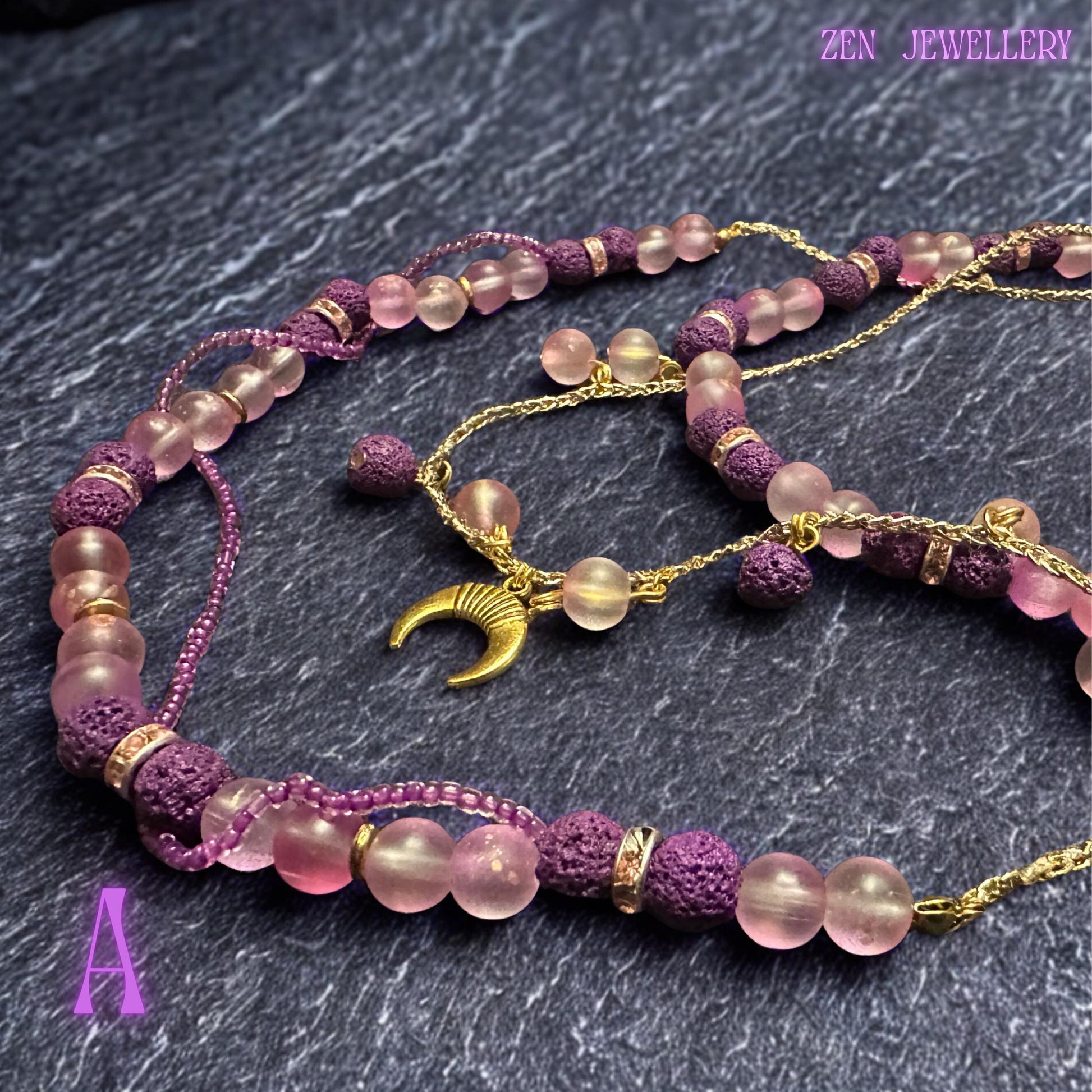 • Detailed image of the upper necklace strand featuring alternating blush pink round gemstone beads and textured purple lava stone beads arranged symmetrically along a fine gold wire structure. Sparkling crystal spacer rings catch the light gently while the soft pastel colour palette creates a feminine romantic aesthetic inspired by celestial bohemian fashion and handcrafted gemstone jewellery collections.