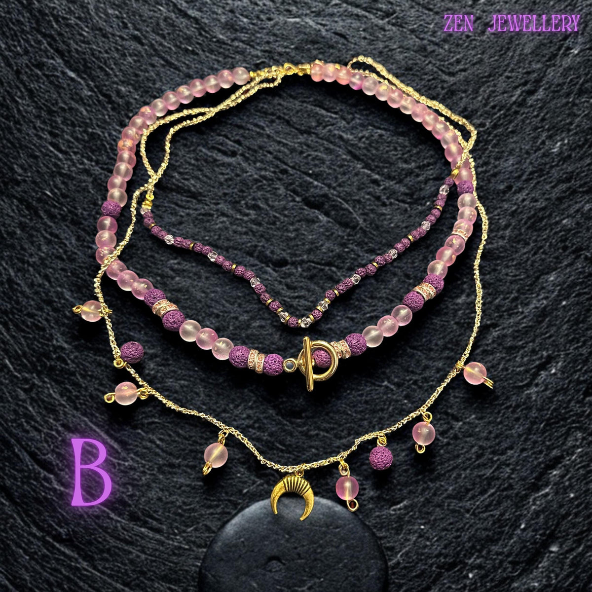 • Close-up detail of the pink gemstone beads revealing their semi-translucent frosted finish and smooth polished surface. The beads reflect soft warm light creating a gentle glowing effect against the dark textured background. Tiny pink seed beads woven into the lower strand add intricate handcrafted detail while gold accents bring elegance and refined sparkle to the romantic bohemian design.