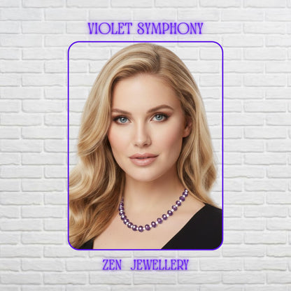 Handmade purple crystal necklace and bracelet set featuring faceted lavender glass beads with delicate white pearl-style spacer beads and silver chain closures displayed on soft satin fabric with lilac flowers in the background creating an elegant romantic jewellery presentation.