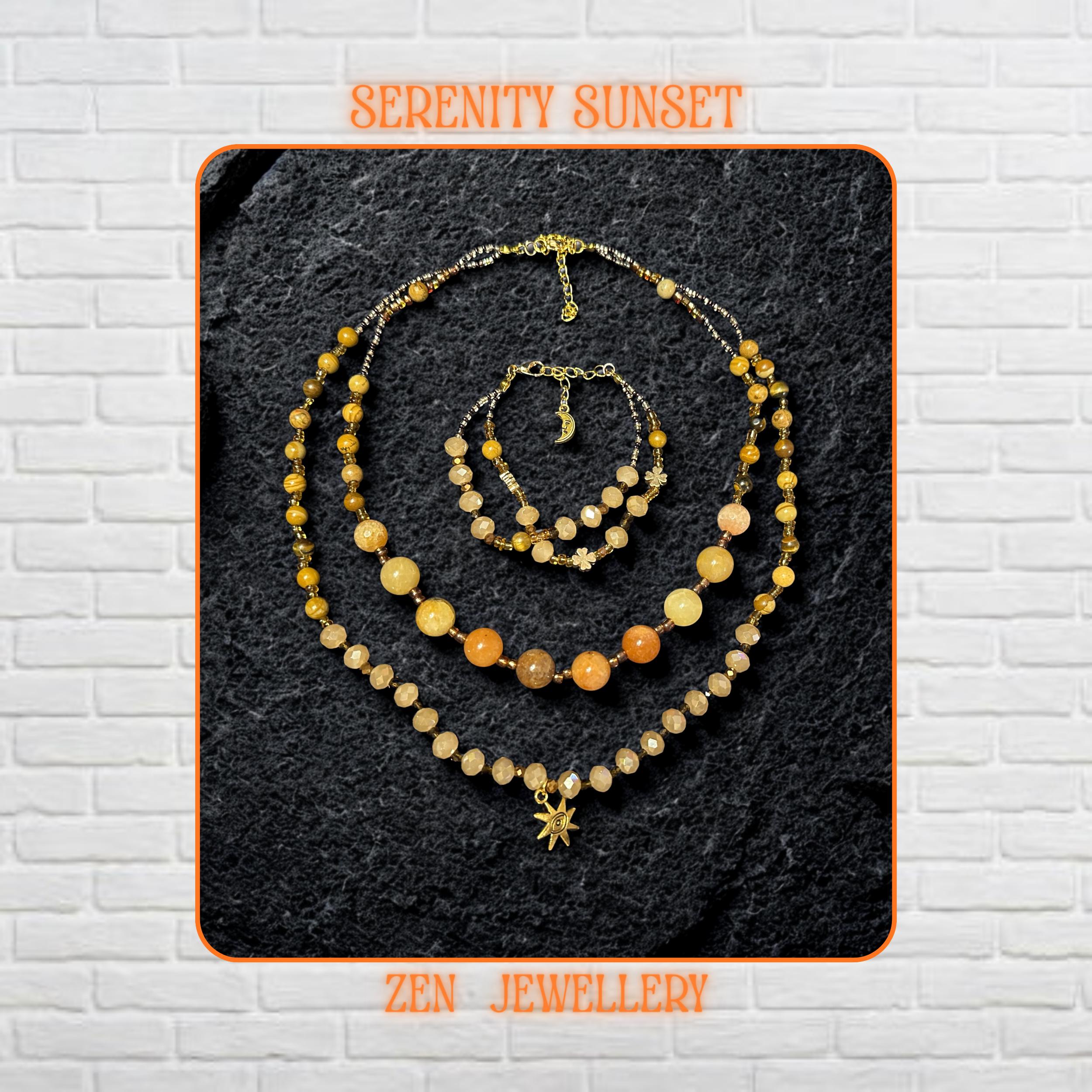 Handmade jade gemstone necklace and bracelet set featuring warm yellow jade, honey jade, amber beads, and champagne crystal beads with gold spacer details and a delicate gold clasp. The layered design sits on a dark textured stone background and creates a rich earthy luxury look with graceful movement.