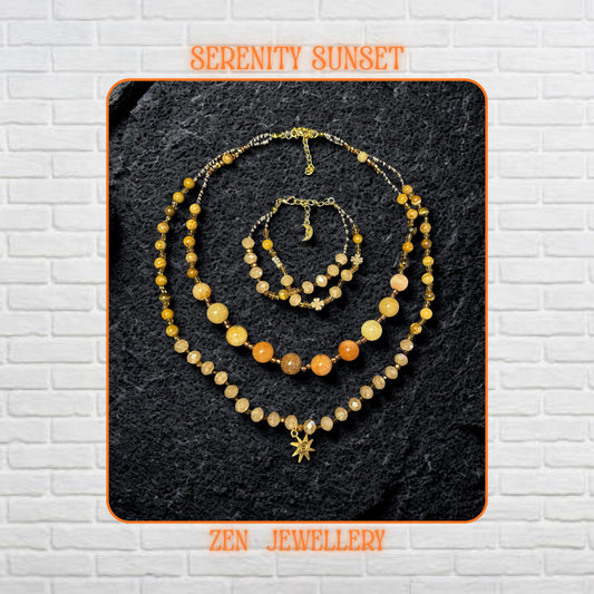 Handmade jade gemstone necklace and bracelet set featuring warm yellow jade, honey jade, amber beads, and champagne crystal beads with gold spacer details and a delicate gold clasp. The layered design sits on a dark textured stone background and creates a rich earthy luxury look with graceful movement.