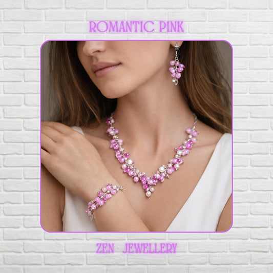 Long handmade AVENTURINE statement necklace displayed on a model with matching bracelet and dangling earrings in soft pink, lilac, lavender, and pearl white tones.  Small silver spacer beads and pearl-like accents add contrast and luxurious detail, while the adjustable chain extension includes a tiny silver star charm for a delicate celestial finish.