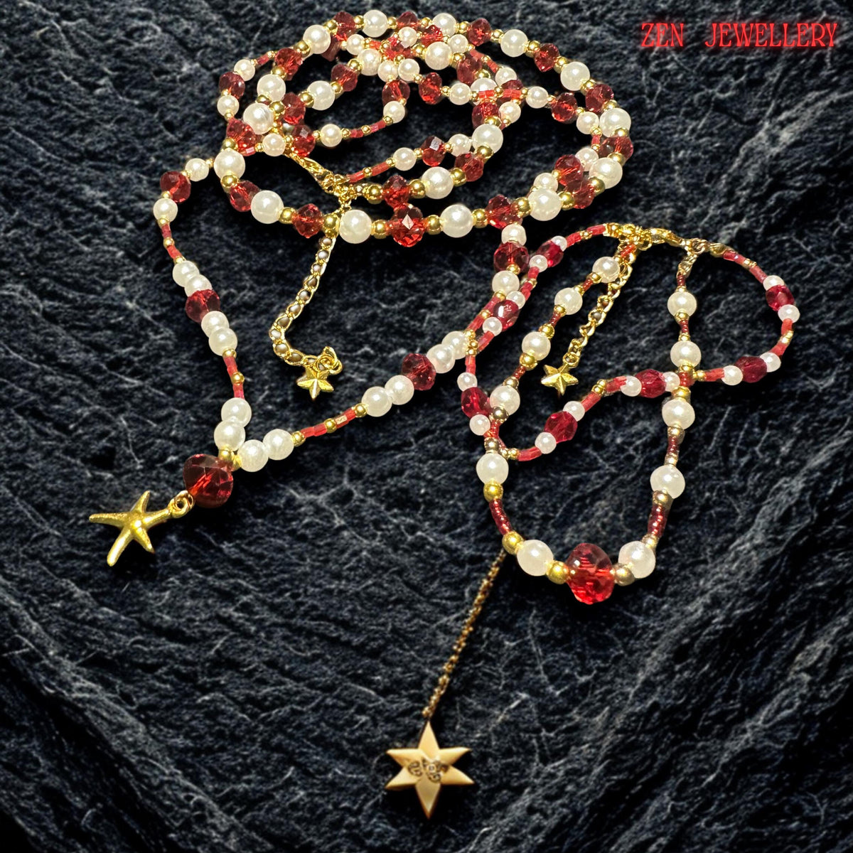 Side angle close-up of the layered necklace strands highlighting the spacing between the faceted ruby crystals and creamy pearl beads. Tiny red seed beads add texture and artistic detail while the fine gold spacers reflect light softly creating movement dimension and graceful elegance across the layered handmade jewellery set.