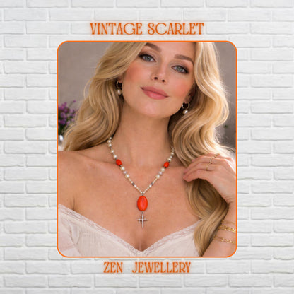 Handmade white pearls and red coral necklace worn on a model featuring creamy ivory pearl-style beads combined with bright red coral-effect stones and a large oval red gemstone pendant finished with a delicate silver star charm. The elegant Y-shaped silhouette sits beautifully along the neckline and creates a romantic statement jewellery look perfect for bohemian fashion, evening outfits, and meaningful gifting.