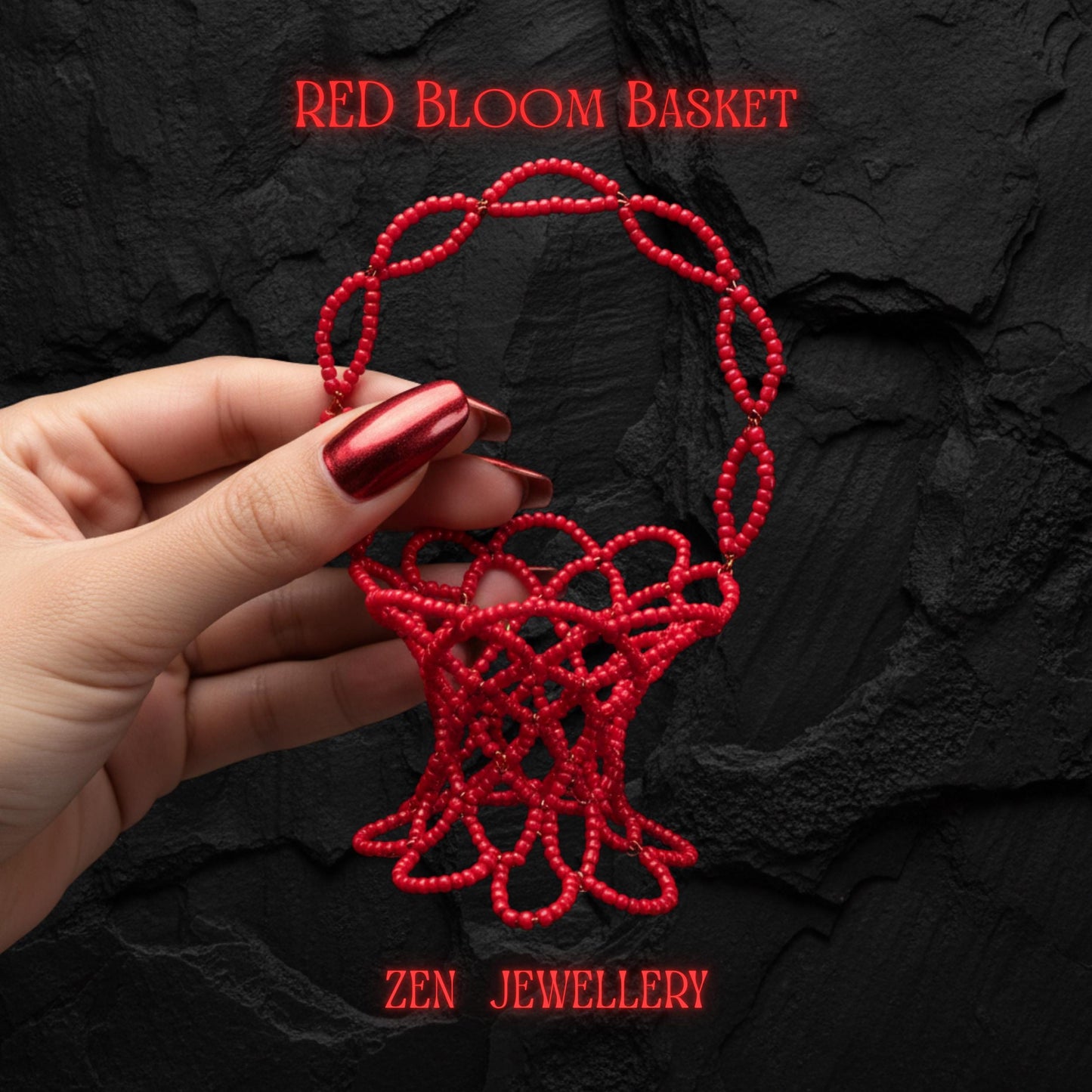 Red beaded mini basket on textured dark stone background, intricate floral pendant design