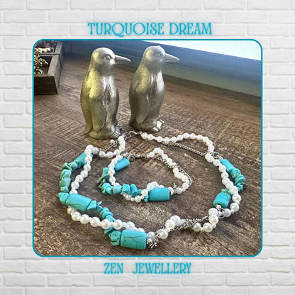 Turquoise pearl necklace displayed on a wood platform, showing 2 strand design with white pearls and turquoise chips, a sterling silver chain visible, styled as layered boho jewellery with a matching bracelet below, highlighting elegant contrast and natural textures.