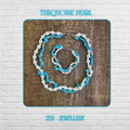 Turquoise pearl necklace and bracelet set displayed on rustic wooden surface with visible turquoise chips and glossy white pearls forming two strands, sterling silver clasp visible, showing natural textures and full matching set composition with necklace approximately 42 cm and bracelet 20 cm.