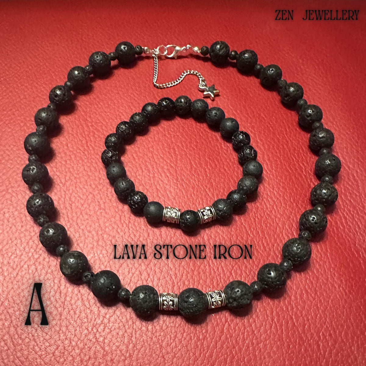 Close-up image of the black lava stone jewellery set showing the porous volcanic texture and matte finish of the natural beads. Silver artisan spacer beads add elegance and contrast between the dark volcanic stones. The necklace is designed with graduated bead sizing for a balanced and sophisticated look, while the matching bracelet features comfortable, rounded lava stones that create a calming and grounding style.